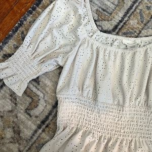 Islet peplum white top